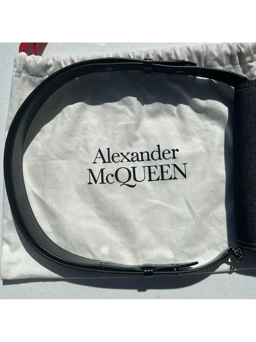 New pre-authenticated Alexander McQueen skull denim bag with dust bag